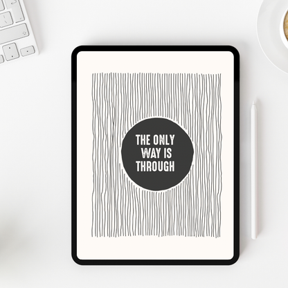 Digital tablet displaying a motivational quote on a white desk with a keyboard and mug.